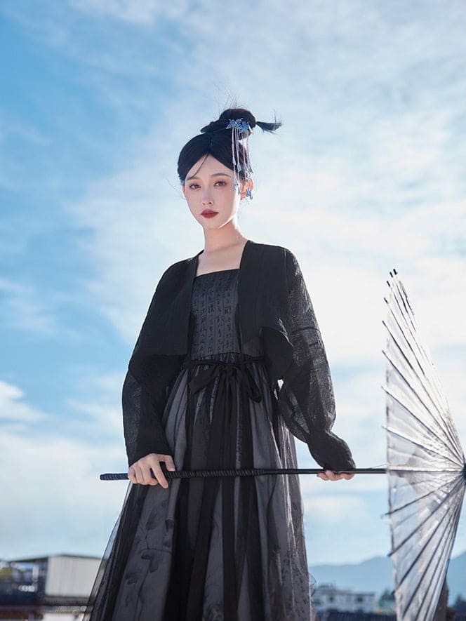 Black Featuring a diverse collection of Hanfu styles, this display presents a blend of traditional and modern elements, from the intricate embroidery of classic Hanfu to contemporary menswear. The assortment includes authentic Tang Dynasty dresses and detailed Ming Dynasty Hanfu, alongside luxurious royal attire and scholar officials' outfits. With a special emphasis on men's Hanfu, the exhibit highlights the rich cultural tapestry of traditional Asian clothing and modern, Asian-inspired fashion