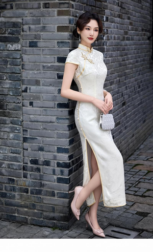 Authentic cheongsam qipao ivory white short sleeve slim maxi dress with side slit mandarin collar modern elegant for women standing front