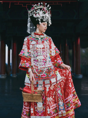 Authentic miao ethnic wedding dress heirloom quality vibrant red brocade for bride traditional ceremony back view