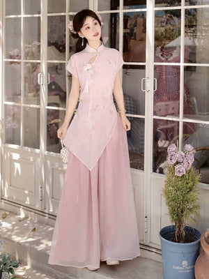 Authentic new chinese style two piece set improved cheongsam dress and retro pink wide leg pants for summer women standing front