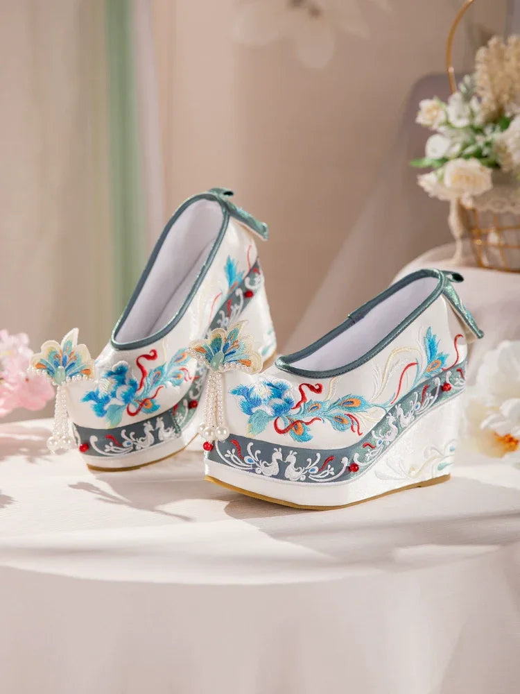 Blue hanfu embroidered shoes women tang style cloud toe flats with 10cm lift for spring and autumn for women front view