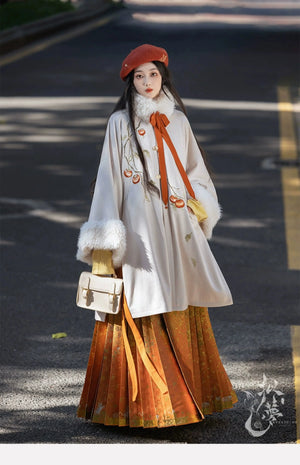 Orange modern hanfu dress for women, inspired by traditional Song Dynasty style and crafted from luxurious silk. This versatile hanfu includes a coordinating coat or jacket, making it ideal for winter wear, Chinese New Year celebrations, or casual outings. Suitable for events such as graduations and cosplay, this hanfu blends classic Chinese elegance with contemporary fashion, perfect for anyone looking for where to buy hanfu or shop authentic hanfu for sale. Available at our online hanfu shop, offering opt