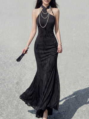 Black flocked knitted cheongsam fishtail skirt paired with chiffon open-sleeve coat and cloud temples oblique hairpin