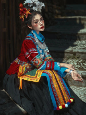Colorful miao tujia minority ethnic dress traditional costume for stage performance and travel photography back view