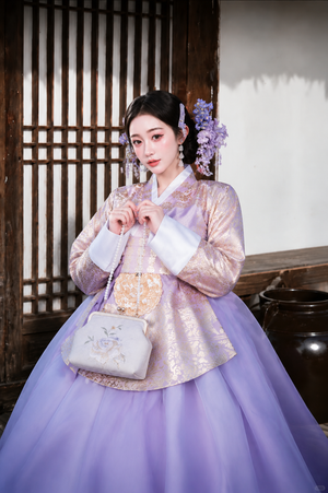 Complete purple mist floral hanbok set gilded jacquard top with ombre tulle skirt for outdoor photography full length view
