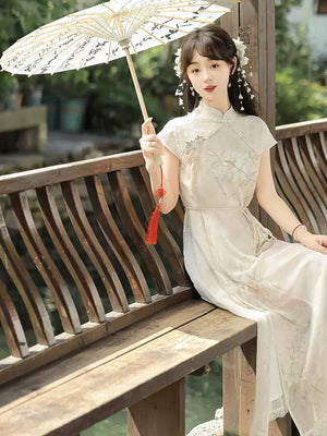 Elegant lolita modern hanfu dress ivory mandarin collar short sleeve cheongsam with layered lace tulle skirt sweet chinese garden style for women side view