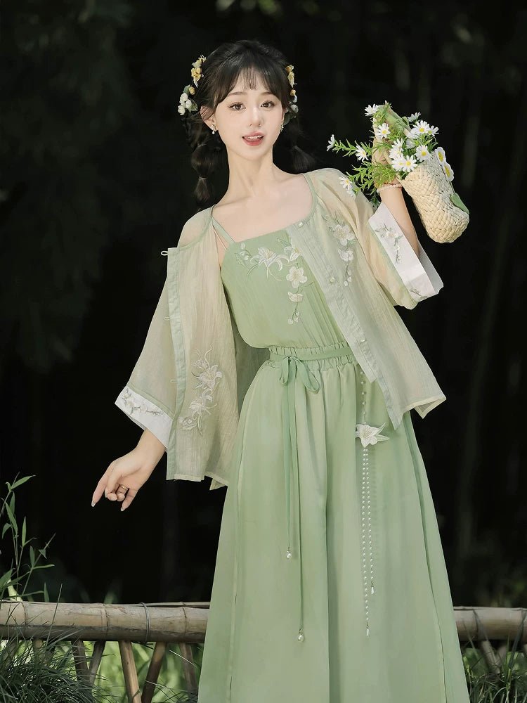 Elegant modern hanfu set white wide sleeve top with sage green wide leg pants casual everyday chinese style for women side view