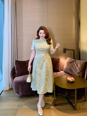 Elegant plus size modern chinese qipao jacquard fabric mandarin collar dress with cut out design details side view