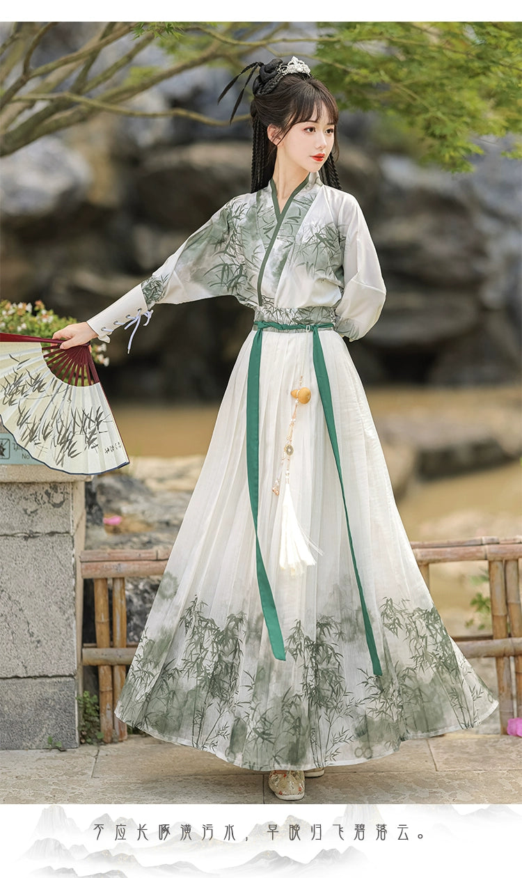 A traditional Chinese hanfu in a beautiful combination of pink and green, designed for women. This elegant dress is perfect for celebrating Chinese festivals like the Lunar New Year, as well as for cultural performances or cosplay events, showcasing classic Chinese fashion with a modern twist.