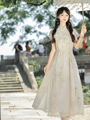 Lolita modern hanfu dress ivory mandarin collar short sleeve cheongsam with layered lace tulle skirt sweet chinese garden style for women front view