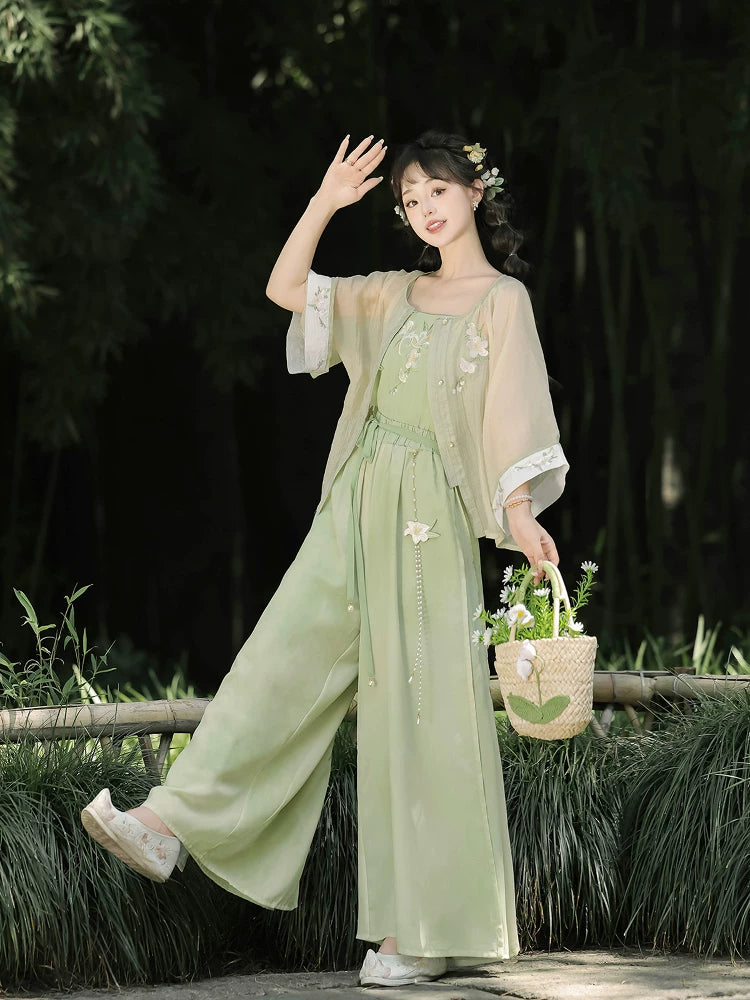 Modern hanfu set white wide sleeve top and sage green wide leg pants casual everyday chinese style for women front view
