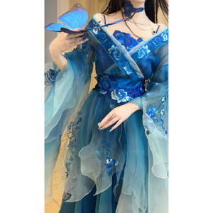 Red hanfu dance costume detail with translucent embroidered fabric