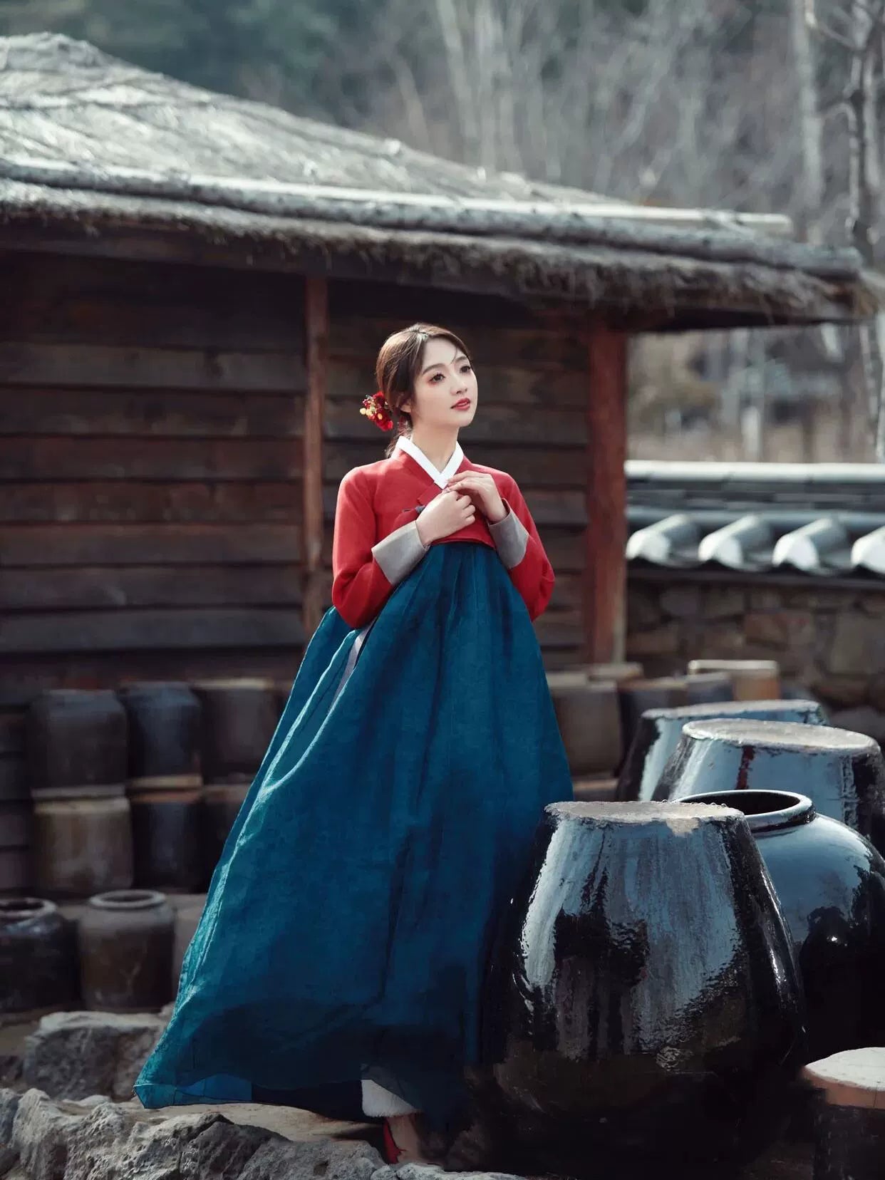 Traditional Korean Hanbok Wedding Dress in vibrant red and blue, designed for national stage dances and ceremonial occasions.