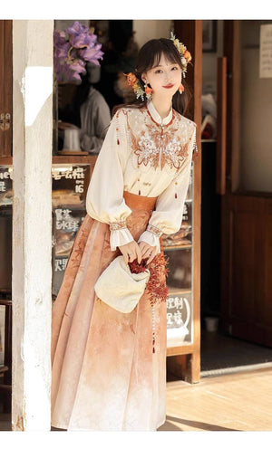 Chic Hanfu outfit featuring a floral embroidered top and ombre pleated skirt, perfect for daily wear and seasonal transitions.