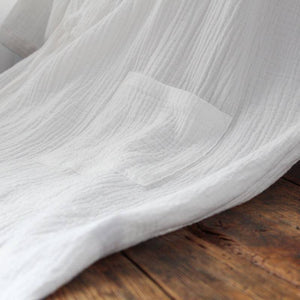 Close-up of pocket detail on Chinese style pure white Hanfu robe, showcasing soft cotton texture for homewear comfort.