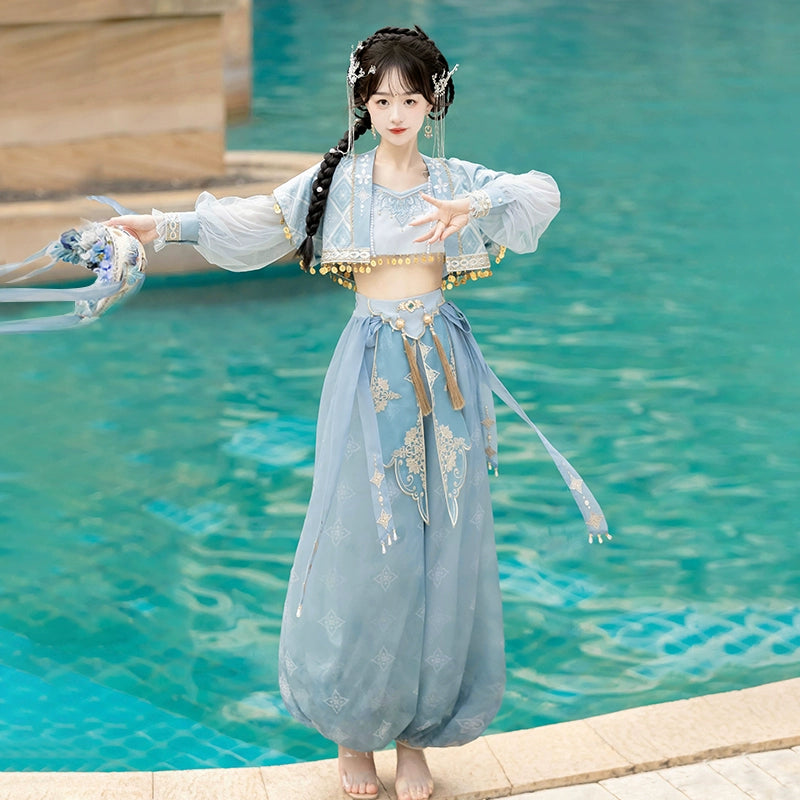 Model in blue Hanfu Princess Jasmine suit by 【Cloud Traveler】, posing by the pool in ethnic Dunhuang-inspired fashion.