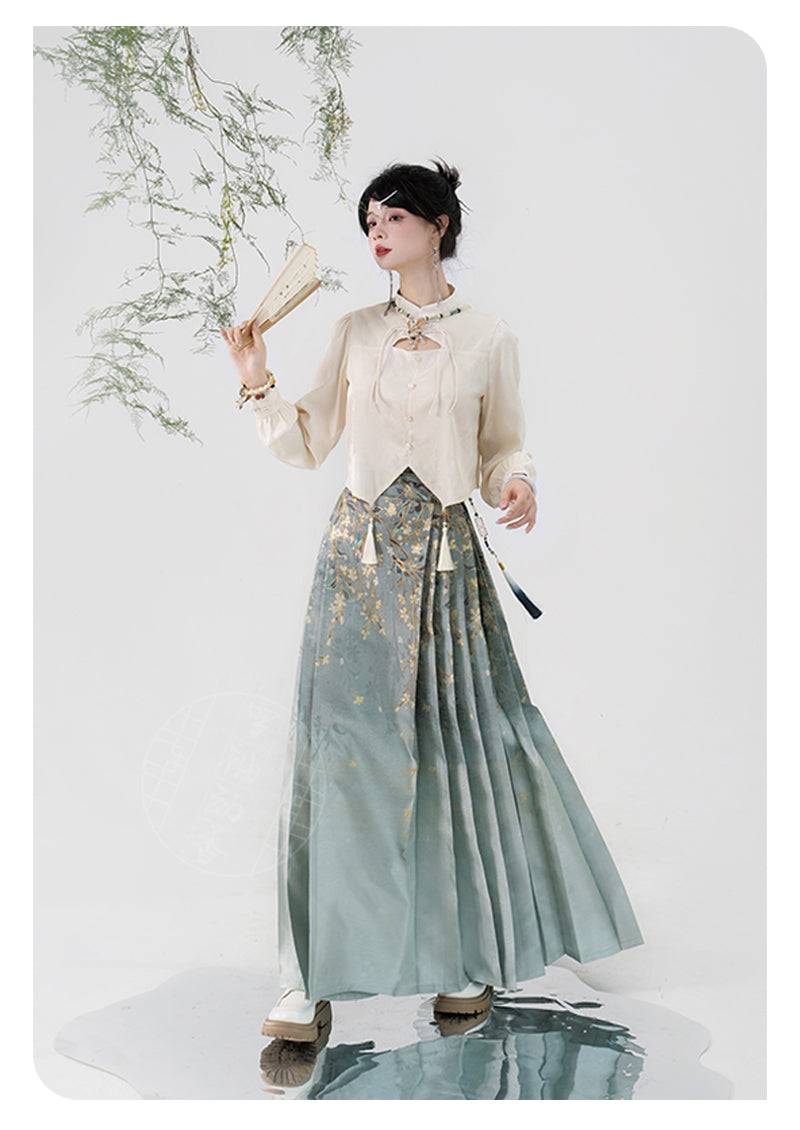 Women's Ming-dynasty Hanfu horse skirt with weeping silk jasmine design, featuring gold floral embroidery and pleated silhouette.