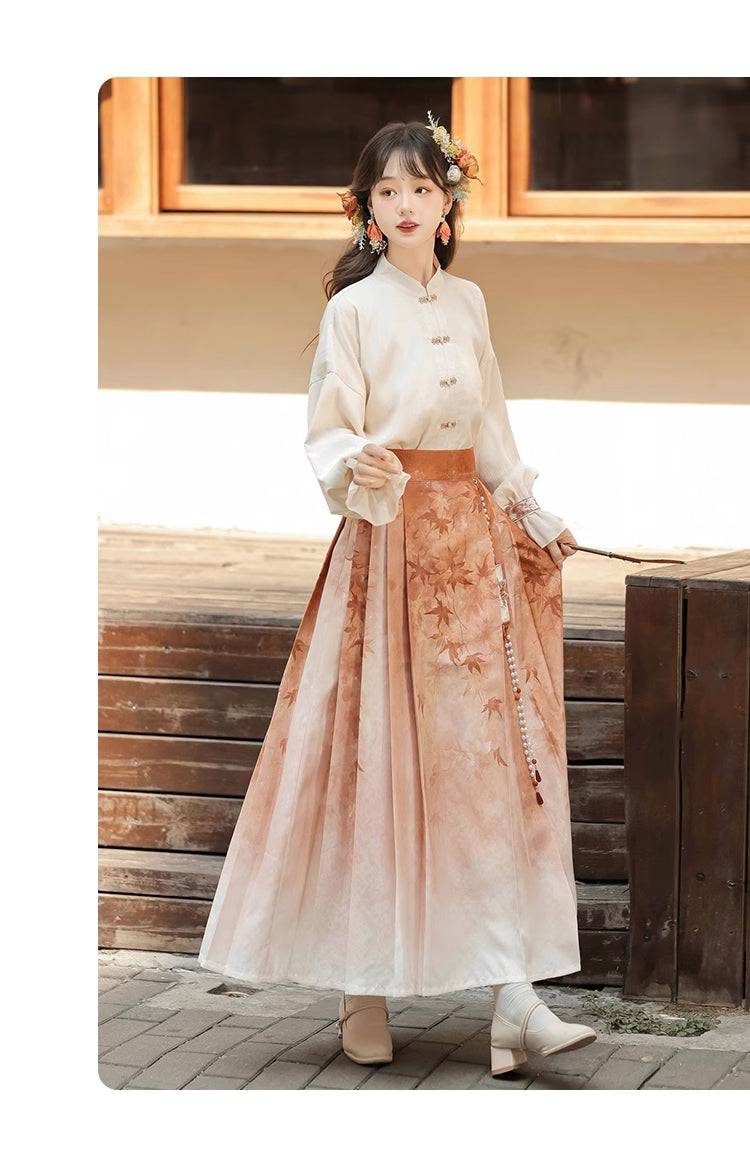 Side view of elegant Hanfu set with buttoned top and maple leaf printed skirt, ideal for spring fashion lovers.