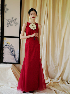 Side view of red cheongsam wedding dress with tulle panels, ideal for bridal toasting or engagement.