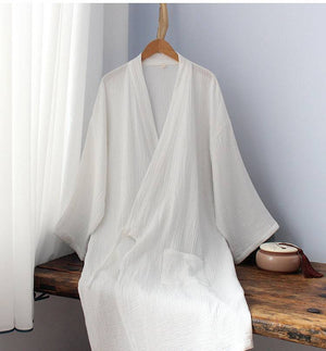 Elegant Chinese style Hanfu robe in pure white cotton, draped on bench, perfect for homewear or pajama top.