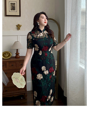 Close-up of plus size embroidered cheongsam with sheer lace neckline and floral detailing, highlighting traditional China style.