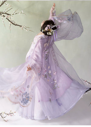 Dynamic pose in Purple Hanfu women's Song Dynasty embroidered big-sleeved shirt with swirling motion and floral accents.