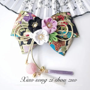 Black and gold Japanese kimono hairpin with multicolor cherry blossoms and tassels, perfect for traditional or lolita fashion.