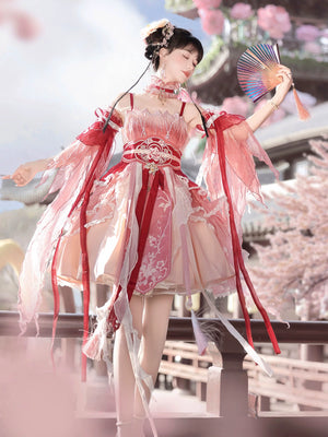 Model holding fan in Red Hanfu Dress New Chinese Feather Rust Waist Seal Suspender Skirt with floral motifs and flowing sleeves.