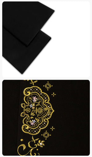 Black coat cuff and gold embroidery details