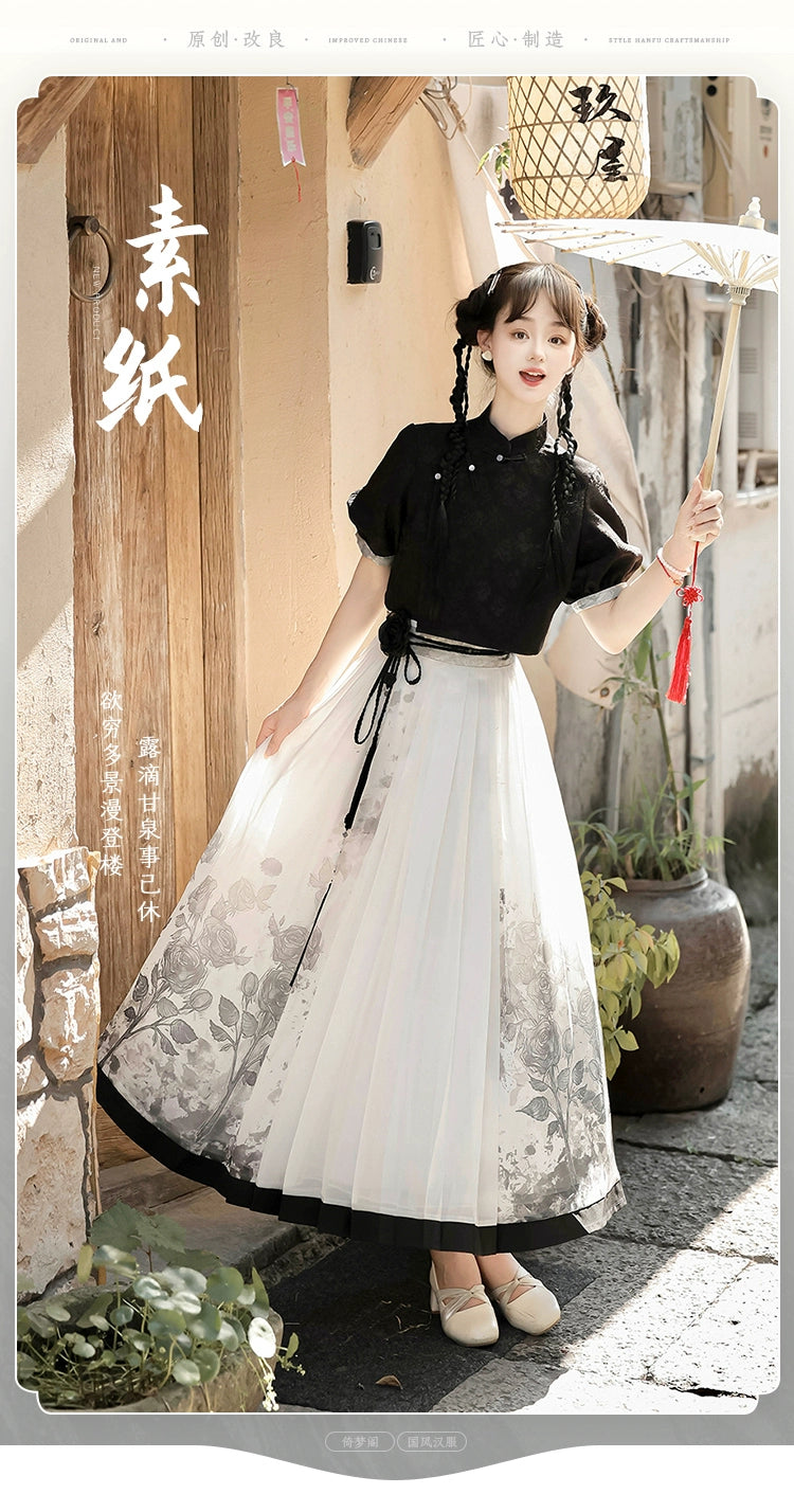 Model wearing Chinese black top and floral print skirt set with parasol, styled for spring and summer in modern Hanfu look.