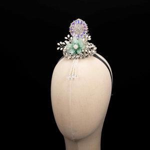 Elegant Korean traditional ethnic headgear on mannequin, showcasing intricate floral and pearl details for Korean princess hair accessories.