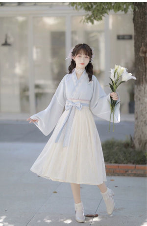 Elegant Blue&Pink Modern Hanfu dress with flared sleeves and pastel lace skirt, perfect for spring fashion and cultural events.