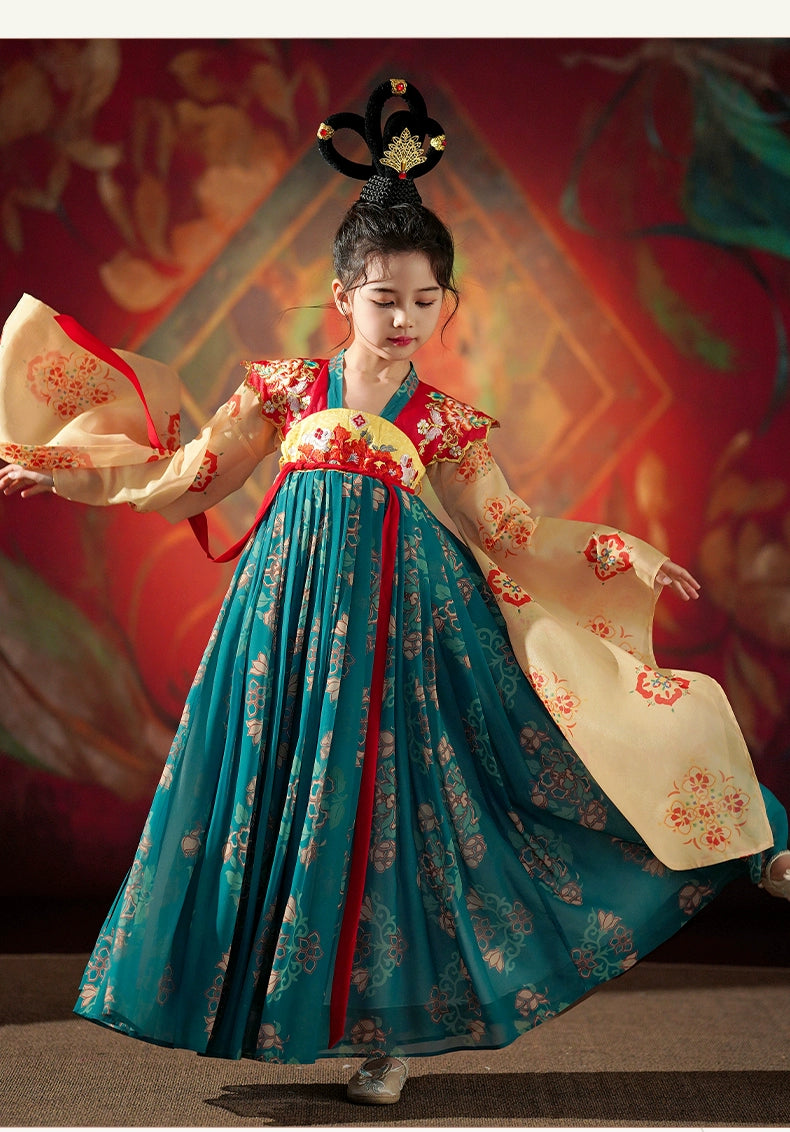 Girl in traditional Hanfu twirling in teal and beige dress with floral prints, inspired by ancient Dunhuang and Tang styles.