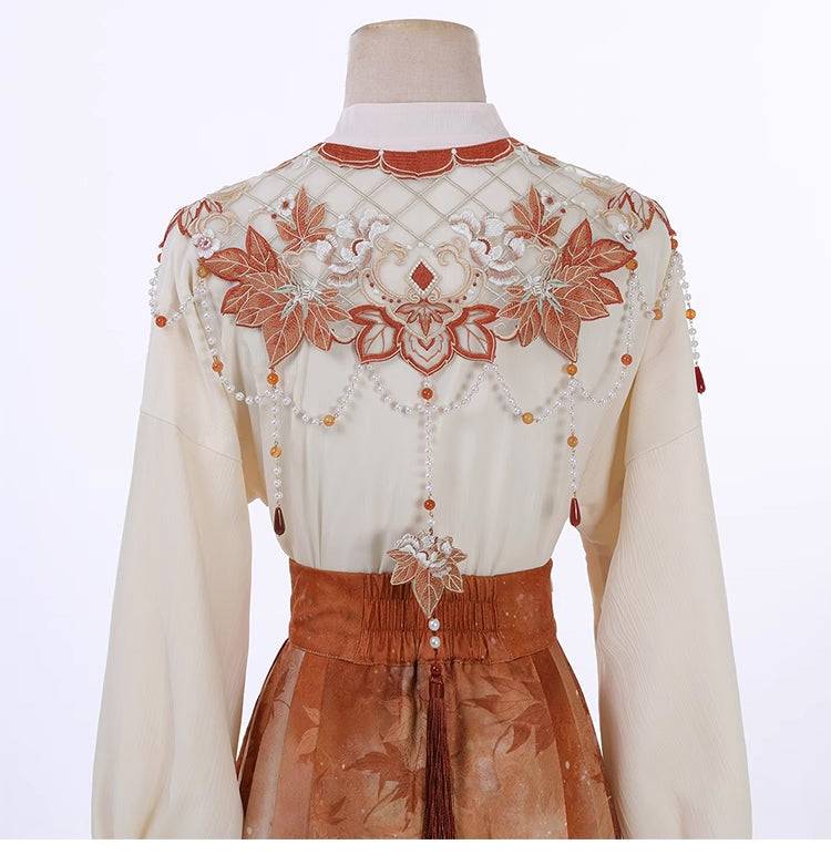 Detailed back embroidery of cloud shoulder top in Maple Leaf Hanfu, showcasing floral and beadwork craftsmanship.