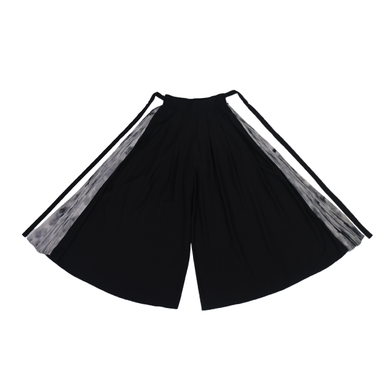 Flat lay of black improved Song pants with tie-dye accents, designed for modern Hanfu outfits in spring and summer collections.