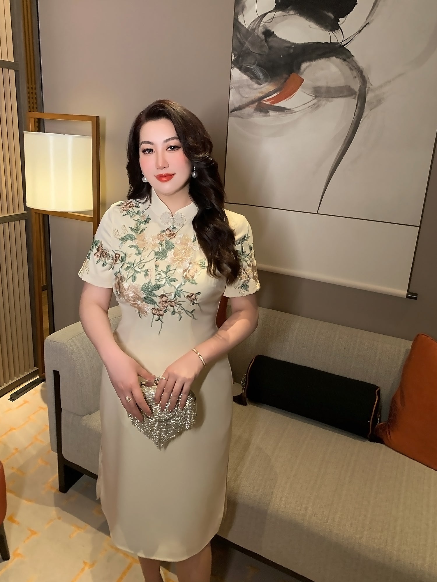 New Chinese style champagne embroidered plus size long cheongsam/qipao with floral detailing, ideal for elegant evening wear.