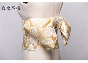 Gold and white brocade Yukata bow belt with floral embroidery. A sophisticated kimono waist belt for an elegant look.