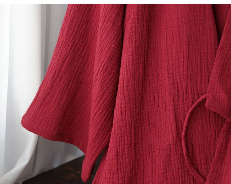 Side view of the red Hanfu-style robe sleeve, highlighting the breathable cotton texture and relaxed summer pajama design.