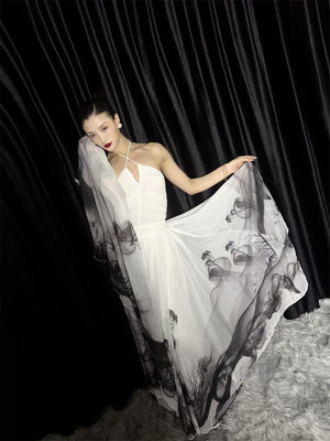 White Chinese watercolor maxi skirt with dramatic full hem by Yandan_Hanfu, model showcasing artistic pattern