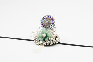 Korean traditional ethnic headgear on white background, adorned with green flower and pearl branches for Korean princess hair accessories.