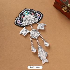 Large Guizhou Miao fridge magnet with black embroidery and silver fish, heart, and coin fringe, 16.2x8cm, handmade ethnic decor.