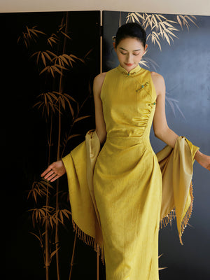 Yellow Cheongsam Wedding Dress with matching shawl, featuring dark floral patterns and a fitted silhouette for bridal elegance.
