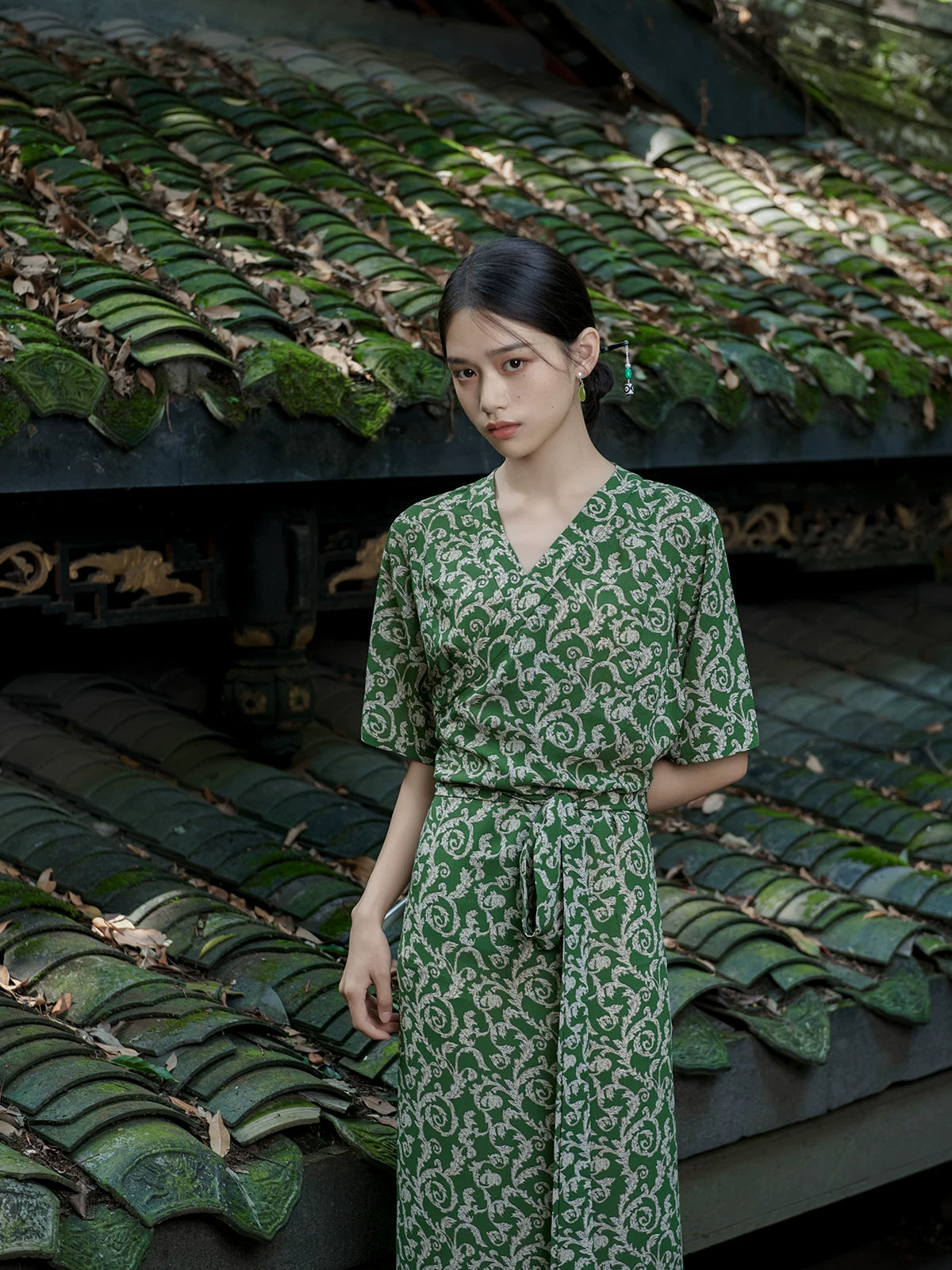 Elegant green chiffon Xizang-inspired dress front view with vintage floral styling