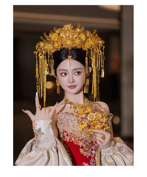 Bride in golden headdress and floral jewelry set, styled for traditional Chinese wedding hair accessory fashion.