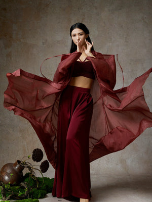Elegant wine red sheer tencel dance ensemble with flowing cardigan, model posing dynamically