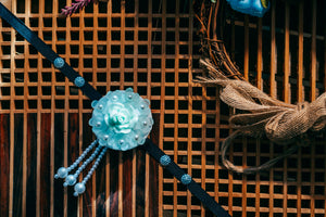 Close-up of B-style Korean traditional headgear with blue rose and pearl tassels, perfect for traditional Korean outfits.