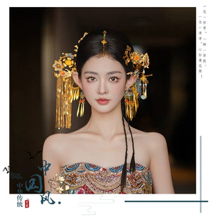Model wearing Chinese butterfly bridal tassel hairpin with antique gold finish, styled for a traditional wedding look.