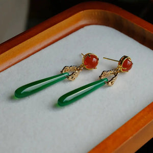 Antique green agate water drop earrings with red gemstone studs and gold accents, ideal for New Chinese style cheongsam or Hanfu fashion.