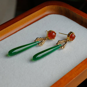 Antique-inspired green agate water drop earrings with red gemstone tops and gold chain links, perfect for traditional Chinese outfits.