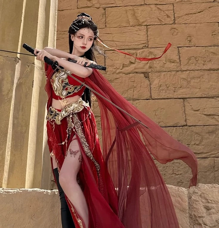 Sacred Flame Western Regions Dancer Classical Clothing Hanfu Women's Exotic Style in red with gold embroidery, posed with sword near ancient stone wall.